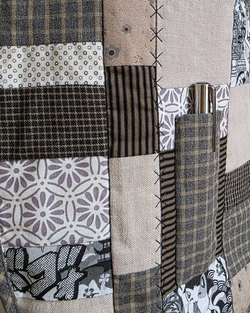 Poche à stylo de Gilet Variations,  Ma. Opus I. 