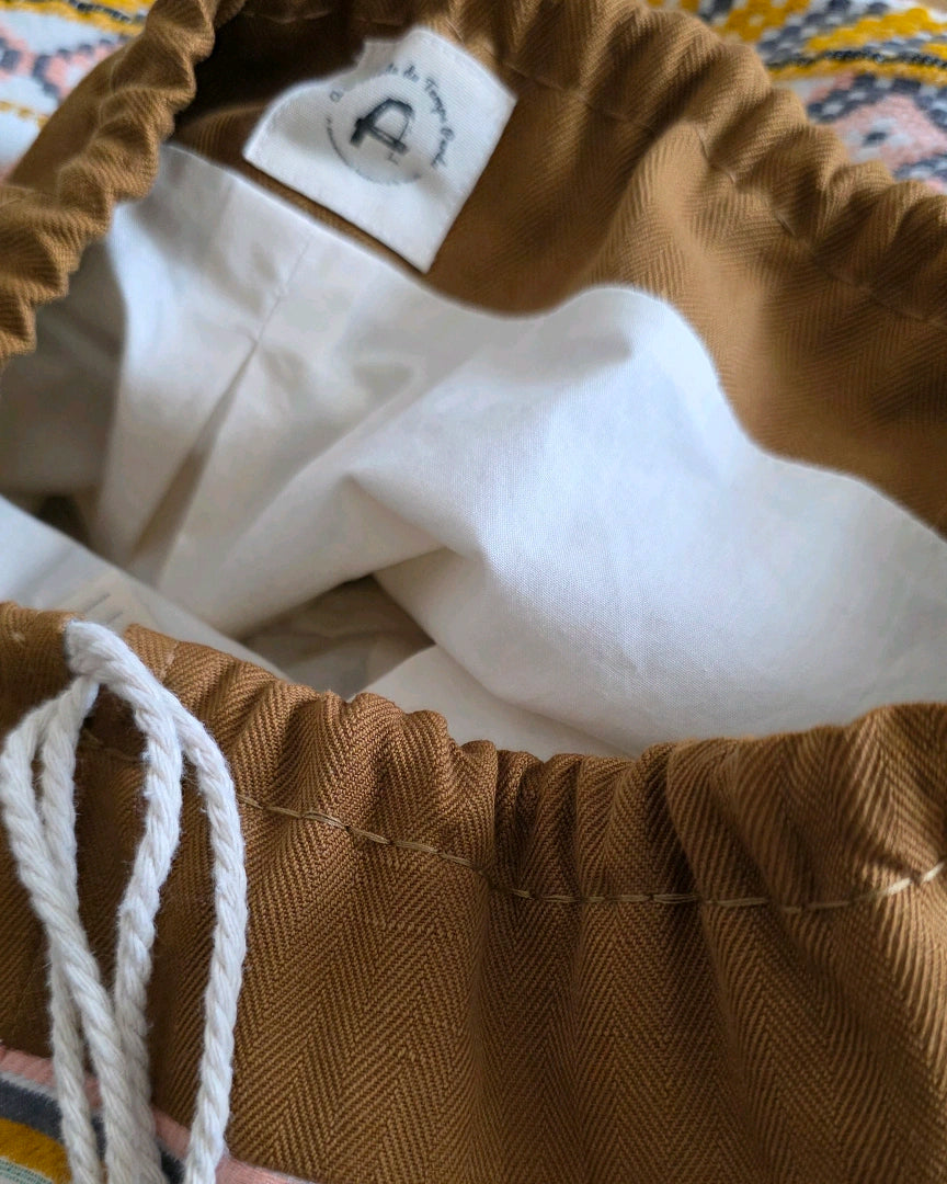 sac baluchon jacquard coton lin doublure coton fait main atelier francais a la mode du temps perdu finition coulisse couture detail interieur sac artisanal textile naturel cordon coton